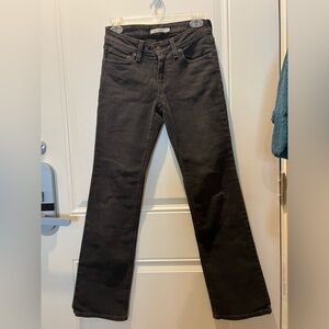NWOT Levi’s super low boot cut blackish jeans. Size 25. Never worn.